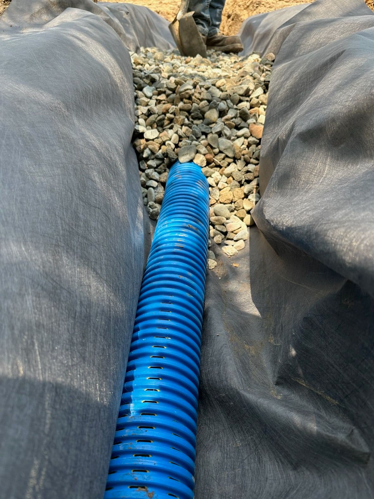 Efficient Downspout Drainage Systems by Yeti Earthworks image